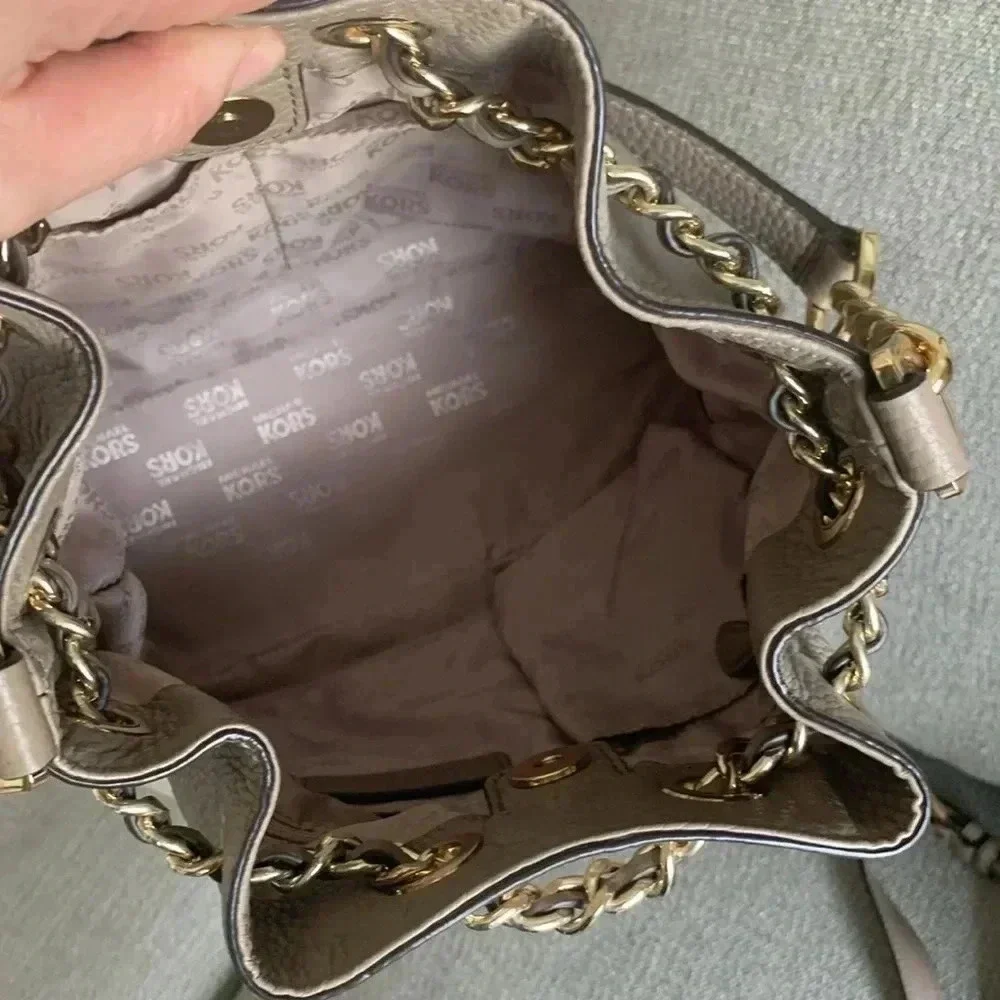 Michael Kors crossbody chain drawstring  bucket bag neutral putty color